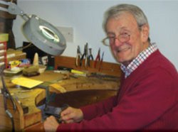 Les Harris at his work bench